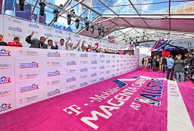 The arrivals carpet was magenta, for sponsor T-Mobile.