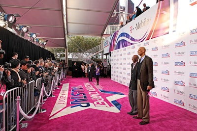 Celebrities arrived to the throng of cameras on the magenta carpet, inset with N.B.A. All-Star and T-Mobile logos.