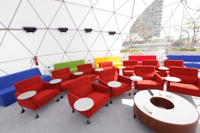 Colorful sofa seating and chairs filled the Google Dome.