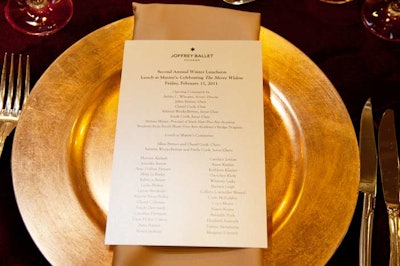 Lunch, which included roast chicken with fingerling potatoes and bundled haricots verts, was presented on gold plates.