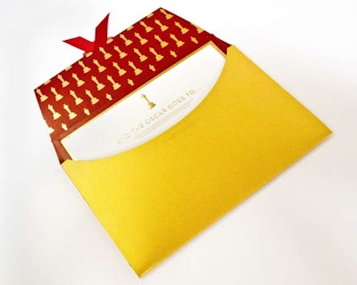Friedland’s custom-designed envelope will be hand-crafted from a high-gloss, iridescent metallic gold paper stock, with a red-lacquered lining bearing the Oscar statuette hand-stamped in satin gold-leaf.