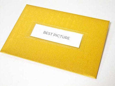 The outside of the envelope and flap is an art deco-inspired satin gold foil frame with an ecru inset panel bearing the name of the award category in charcoal ink.