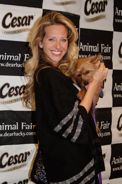 Dina is a cat person (remember Mr. Sprinkles, her bald cat?), but gamely borrowed this pooch for her close-up.