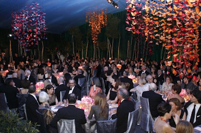 At the dinner Van Cleef & Arpels held to celebrate its new exhibition at the Cooper-Hewitt, Van Wyck & Van Wyck erected a tent in the gardens. Dyed blue silk formed the ceiling of the structure, and 35 custom-cut gobos layered on top of each other mimicked the look of star constellations. The design team added spirals of feathers to create the illusion of thousands of butterflies flying overhead.