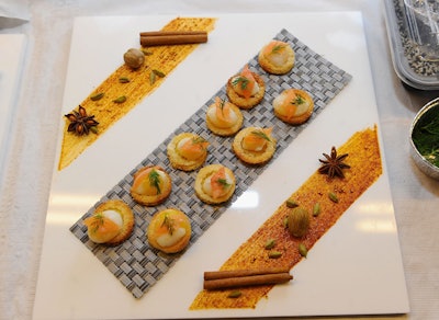 For Lacoste's event, Daniel Boulud prepared passed hors d'oeuvres and the dinner menu, which included roasted Maine lobster, braised short ribs and roasted tenderloin, with apple tart tatin for dessert.