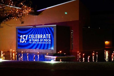 MOCA program manager Janice Angel styled the water feature near the entrance of the museum using torches purchased from Home Depot.