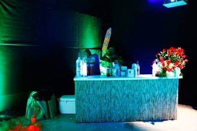 In the 'Night Beach' room where surf movies played on a projector, a bamboo-laden tiki bar served Grey Goose cocktails.