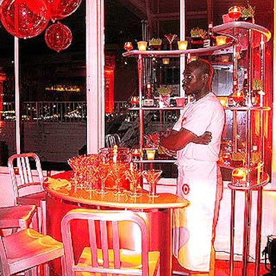 The second floor lounge area featured a small, retro-looking bar area surrounded by barstools and shelves from Props for Today.