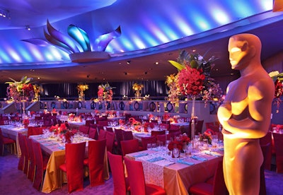 A giant version of a golden Oscar statuette stood sentry at the Governors Ball, where 1,500 guests came for dinner at the Hollywood & Highland Center's Grand Ballroom following the awards.