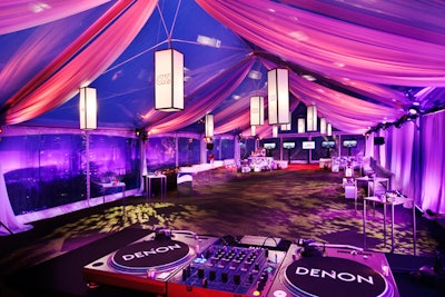 At the OK! and BritWeek party, Precision Event Group hung illuminated logo fixtures from a clear tent atop the London.