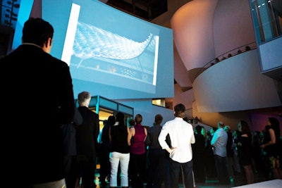 Guests watched a video featuring the Design Awards jury discussing the winners, projected onto a wall.