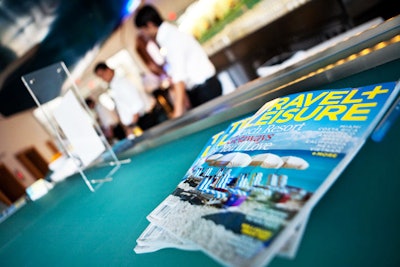 Copies of Travel & Leisure's latest issue, featuring the Design Awards, were displayed on the bar.