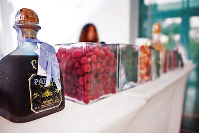 Ingredients and garnishes lined up at Patrón's muddle-your-own mojito bar.