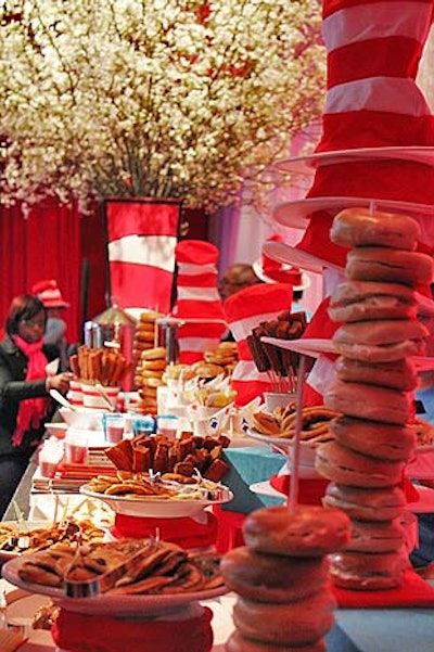 Dr. Seuss-inspired hats, vase covers, colors, and shapes surrounded the spread of food on the buffets.