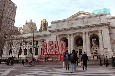 Designed and produced by David Stark, the Read Across America installation at the New York Public Library comprised 26-foot-tall letters spelling the word 'read.' Stark and his crew filled the oversized red characters with 25,000 Dr. Seuss books, which were later donated to local schools.