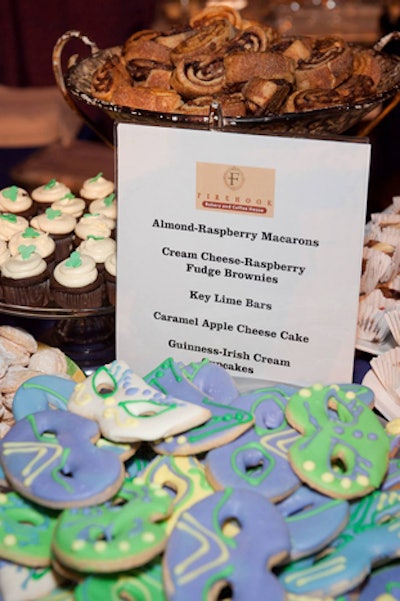 Firehook Bakery and Coffee House served a selection of desserts at its station, including sugar cookies shaped and decorated like Mardi Gras masks.