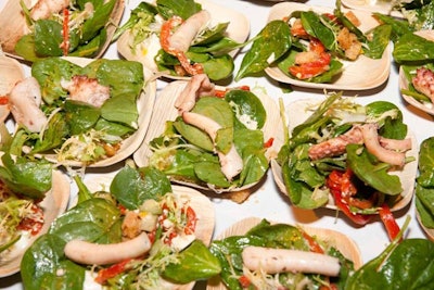 Ris served small plates of octopus salad.