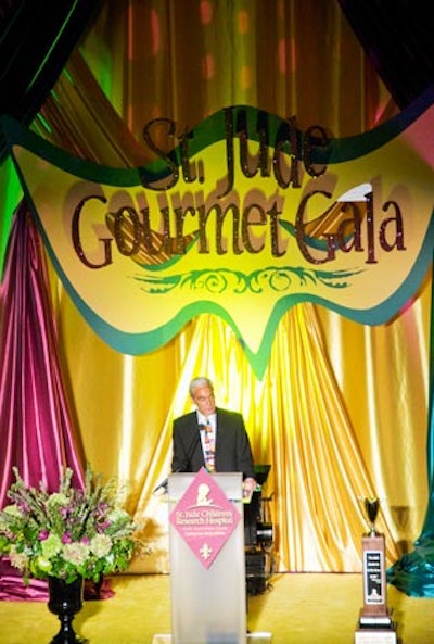 Hargrove used purple, green, and yellow draping suspended from the museum's third floor balcony to create the two stages' backdrops.