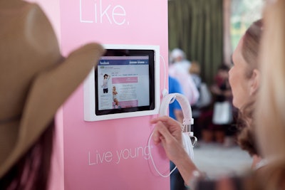 Via touchscreen displays, visitors could log onto their Facebook accounts and like Evian's Live Young campaign as part of the activation.