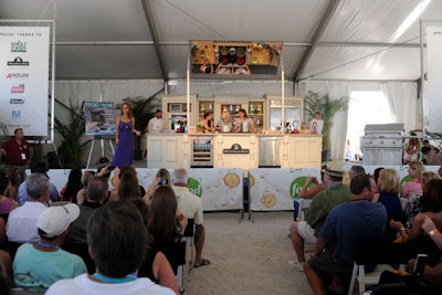 The Food Network's star chefs, including Giada De Laurentiis, made regular appearances on the KitchenAid stages at the Grand Tasting Village to give demos and answer questions from fans.