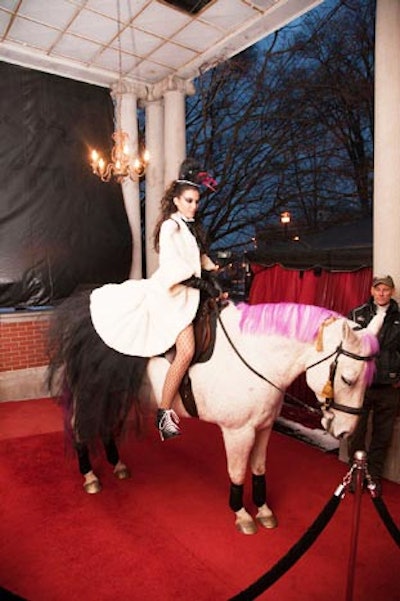 A greeter atop a white horse set the tone for the evening.