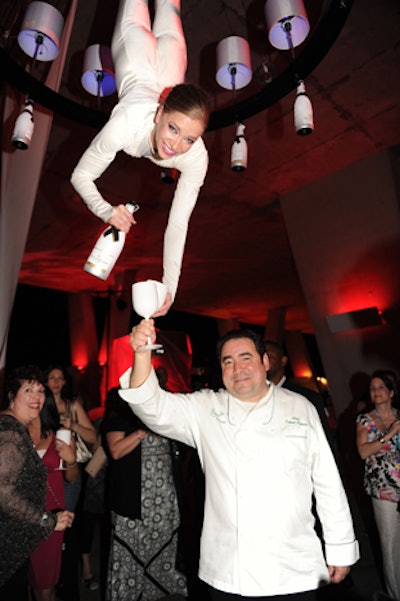 Cirque USA performers served Moët to thirsty guests, including Emeril Lagasse.