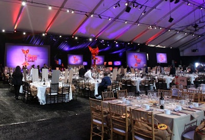 The Spirit Awards' vast main tent, spanning 140 feet by 210 feet, had a simple look, with eggshell linen and either black or natural-framed chiavaris.