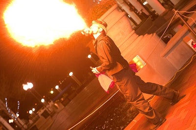 Fire dancers from Dance Afire greeted guests outside the event's secret location.
