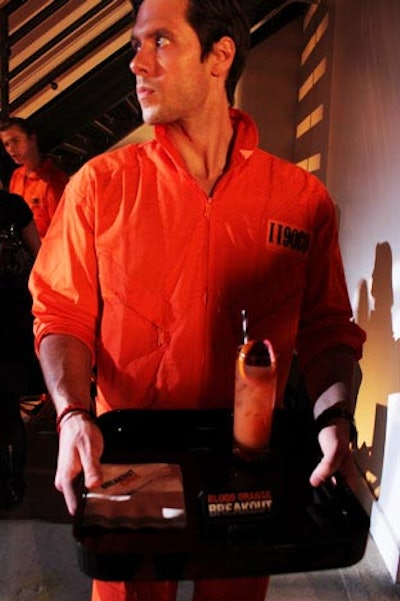 Some design elements, such as the orange jumpsuits worn by the event staff, were a more direct interpretation of the shows thematic elements.