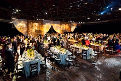 In the main dining room, Altieiri Events topped some 44 tables with linens in green, yellow, and neutral hues.