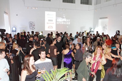 Logos for Miami International Film Festival sponsors were projected onto the walls above the dance floor.
