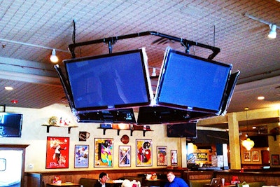 Throughout the venue, flat-screen TVs hook up to laptops and DVD players.