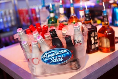 Coke products filled American Idol logo buckets.