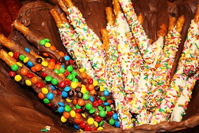 Chocolate- and candy-dipped pretzel sticks were amid the many sweet snacks on offer.