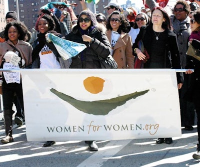More than 750 supporters joined Women for Women International's 'Join Me on the Bridge' in New York, marching across the Brooklyn Bridge with banners.