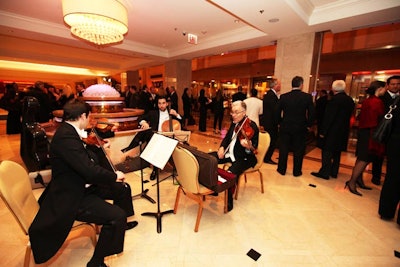 As guests arrived, a string quartet from the Chicago Symphony Orchestra played in the lobby.