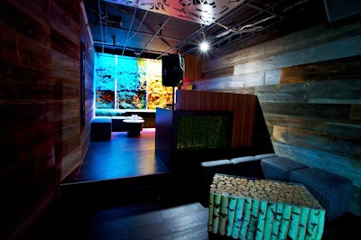 Bamboo and wood plank walls decorate Green Room.