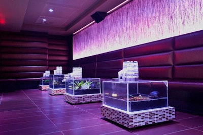 Elements of the outdoors decorate the entire club, such as plants inside the end tables.