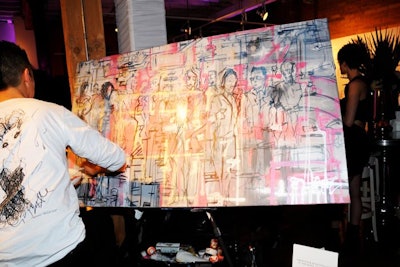 Big Entertainment supplied an artist who painted a mural of the party, which one guest won at the end of the night.