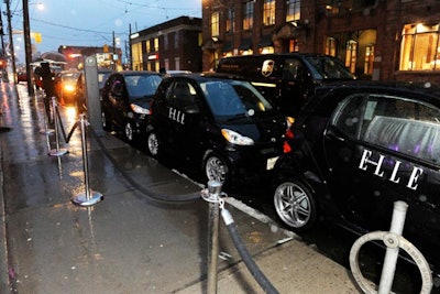 Elle-branded smart cars were parked in front of the entrance.