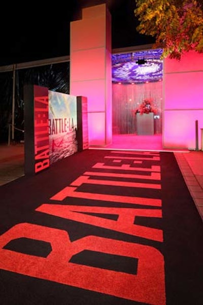 A red inset bearing the movie's title popped against the black carpet.