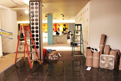 Devinn Bruce, the event designer charged with turning the lobby into a Pop Art-inspired environment, spent a week dressing and furnishing the space. During this time, electricians were still wiring lighting and construction workers knocked through a wall to expand the site.