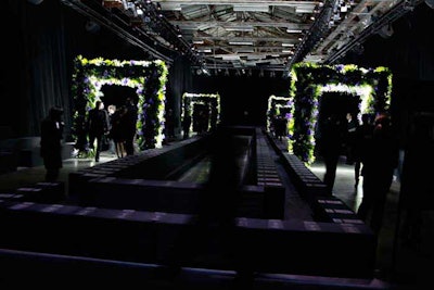 A glossy invitation with a black panther printed on one side and orchids on the other set the tone for Riccardo Tisci's March 6 Givenchy show at the Palais de Tokyo. The decor consisted of illuminated topiary arches, which gave the space a fragrant floral scent, and was contrasted with a growl-laden soundtrack.