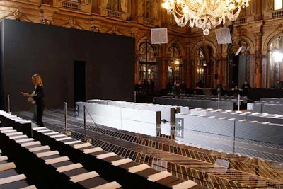 Much like Dior, Roland Mouret played with mirrored glass for his label's outing on March 4. The designer used the reflective material to create parquet-style flooring at the Grand Hotel, allowing the clothes to be seen from multiple angles.