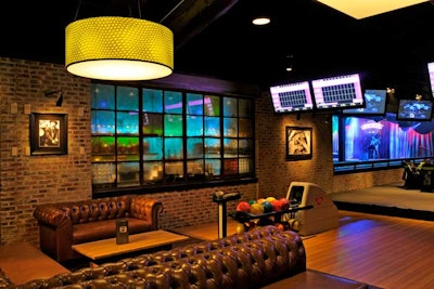 With tufted leather couches and cocktail service, the bowling lounge can host events for 60 guests.