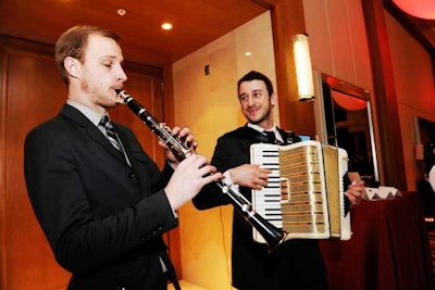 Musicians entertained with clarinet and accordion tunes.
