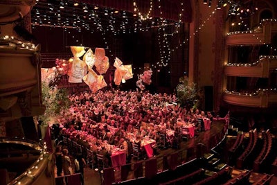 The BAM theater gala started with dinner onstage at the Howard Gilman Opera House, decorated with paper inspired by the writing of Geoffrey Rush's character in The Diary of a Madman.