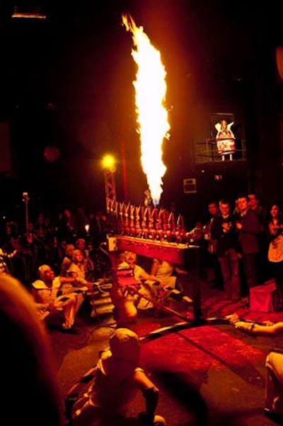 Bursts of fire shot out of the organ in time to operatic music. Before the performance, staffers made sure that all guests were seated at a safe distance.