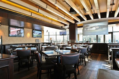 Four-top tables and a double-sided projection screen are available for semiprivate events.