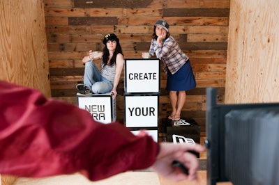 Branded portrait stations let guests take home reminders of who's footing the bill, like hat outfitter New Era.